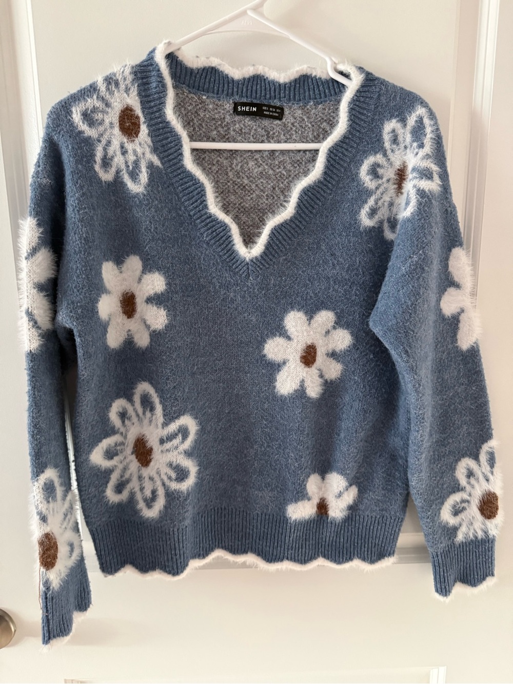 SHEIN Blue Fuzzy V-Neck Sweater with White & Brown Daisy Motif